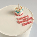 Cake with Mini cake topper + Candle